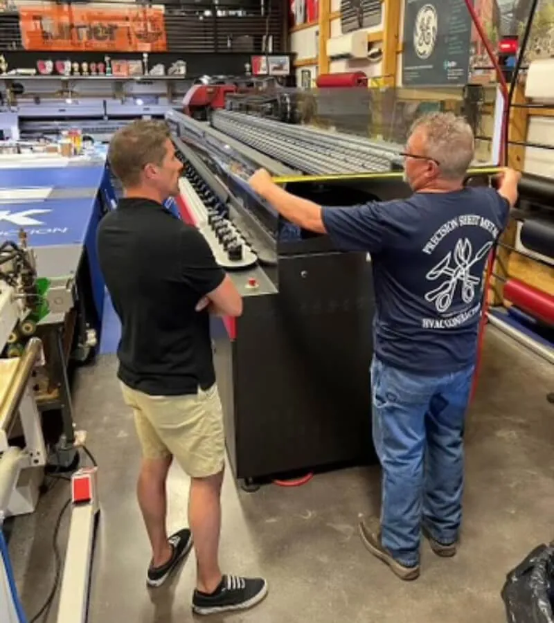 Precision employee discussing project with client